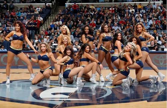 NBA dance team group photo on court